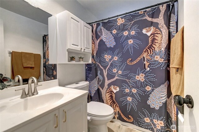 17634 118th Ave SE, Renton, WA 98058 - bathroom with toilet, vanity, and a shower with curtain