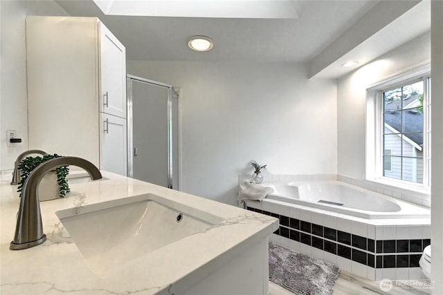 17634 118th Ave SE, Renton, WA 98058 - full bath with a garden tub, a stall shower, recessed lighting, and vanity