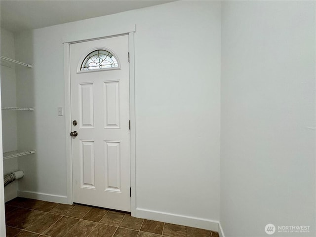 8312 121st St SW, Lakewood, WA 98498 - foyer entrance featuring baseboards