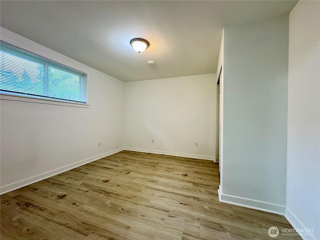 8312 121st St SW, Lakewood, WA 98498 - spare room with wood finished floors and baseboards