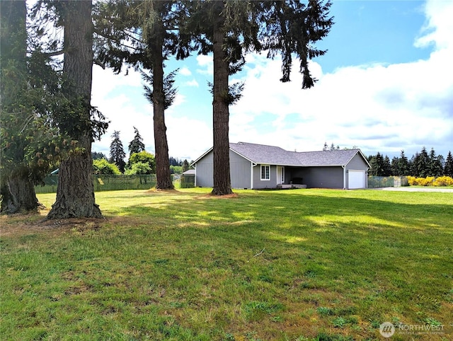 9441 180th Way SW, Rochester, WA 98579 - view of yard featuring a garage