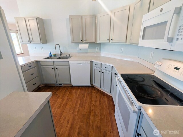 9441 180th Way SW, Rochester, WA 98579 - kitchen featuring white appliances, a sink, gray cabinetry, and dark wood-type flooring