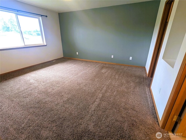 9441 180th Way SW, Rochester, WA 98579 - spare room featuring carpet and baseboards