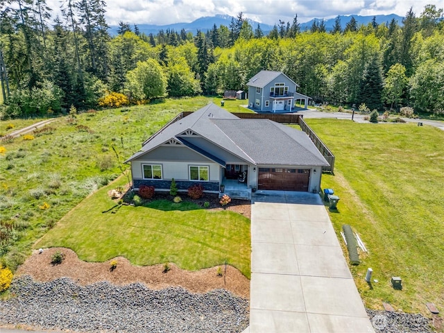 1109 Walker St, Port Angeles, WA 98363 - aerial view of property and surrounding area featuring a heavily wooded area and mountains