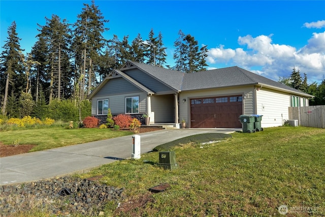 1109 Walker St, Port Angeles, WA 98363 - view of front of home with a garage, driveway, and central air condition unit
