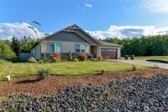 1109 Walker St, Port Angeles, WA 98363 - craftsman house featuring driveway, an attached garage, a front lawn, and stone siding