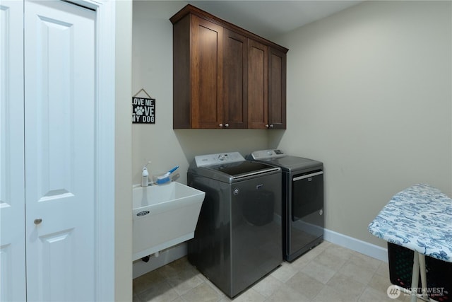 1109 Walker St, Port Angeles, WA 98363 - laundry area with independent washer and dryer, cabinet space, and baseboards