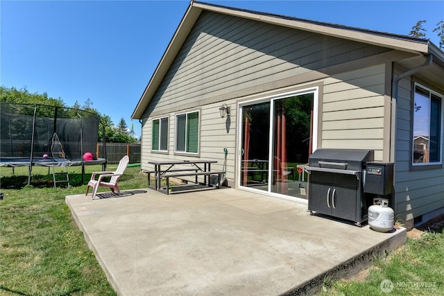 1109 Walker St, Port Angeles, WA 98363 - rear view of property featuring a trampoline and a patio area