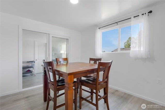 7412 E E St, Tacoma, WA 98404 - dining area featuring light wood-style flooring