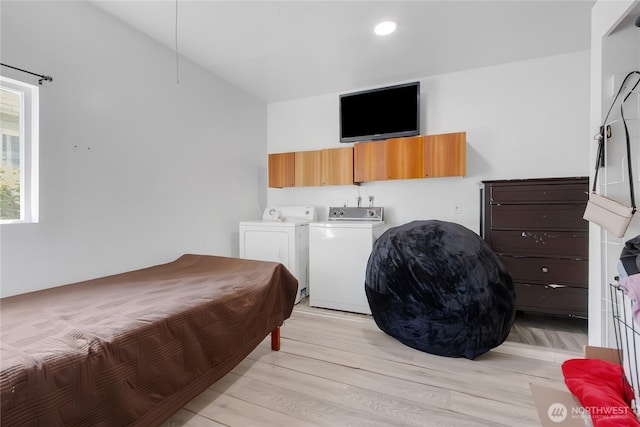 7412 E E St, Tacoma, WA 98404 - bedroom featuring washer and dryer, light wood finished floors, and recessed lighting