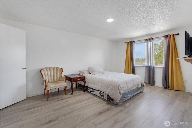 7412 E E St, Tacoma, WA 98404 - bedroom with a textured ceiling, light wood finished floors, and recessed lighting