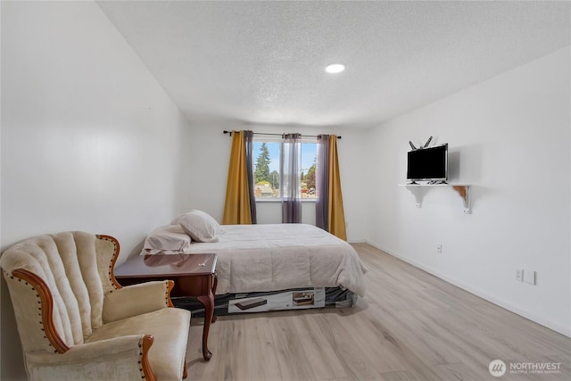 7412 E E St, Tacoma, WA 98404 - bedroom featuring a textured ceiling, light wood finished floors, and recessed lighting