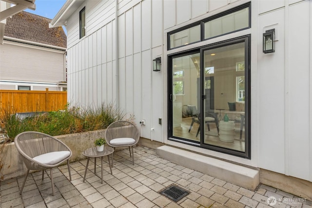view of patio / terrace featuring fence