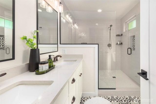 bathroom with a stall shower, tile patterned flooring, double vanity, and recessed lighting