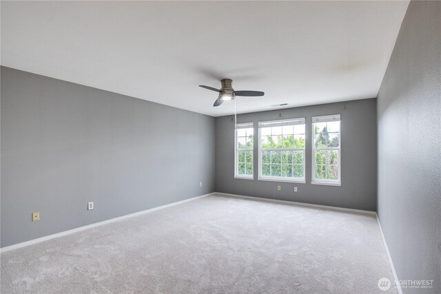 16016 NE 41st St, Vancouver, WA 98628 - carpeted empty room with a ceiling fan and baseboards