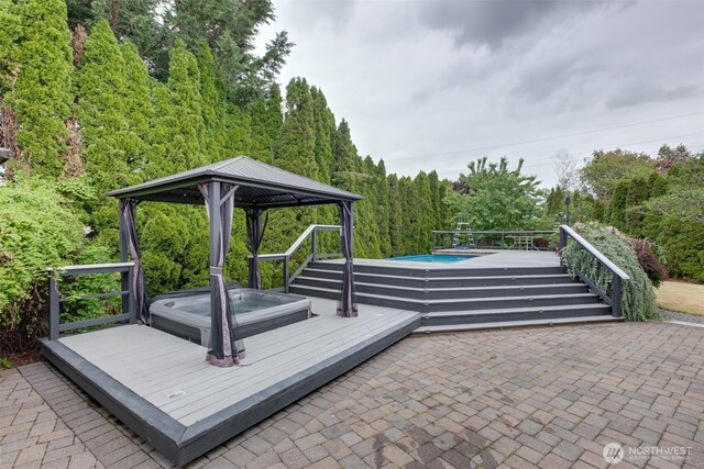 16016 NE 41st St, Vancouver, WA 98628 - view of patio featuring an outdoor hot tub, a gazebo, an outdoor pool, and a wooden deck