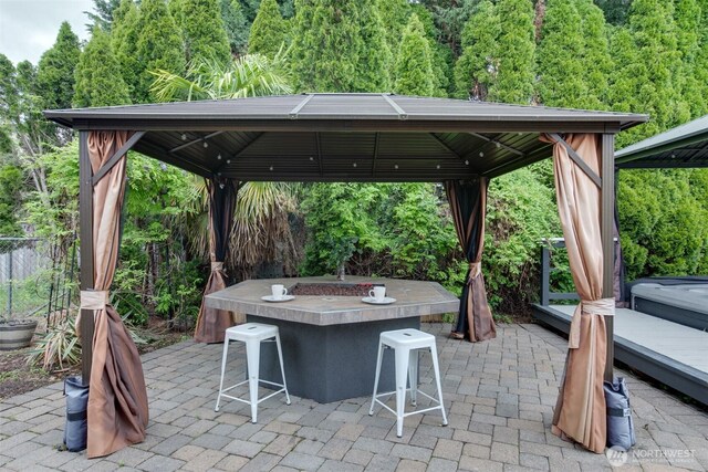 16016 NE 41st St, Vancouver, WA 98628 - view of patio / terrace with a gazebo, a view of trees, and fence