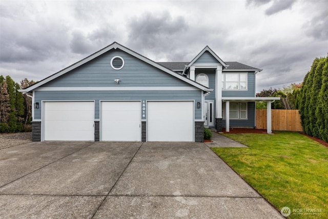 16016 NE 41st St, Vancouver, WA 98628 - traditional home with a garage, driveway, and stone siding