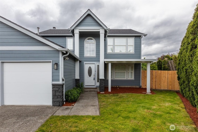 16016 NE 41st St, Vancouver, WA 98628 - traditional home with a garage, driveway, stone siding, and roof with shingles