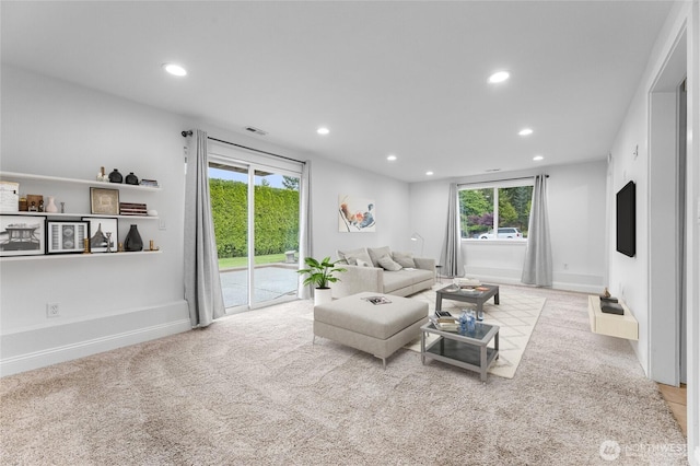 16912 49th St E, Lake Tapps, WA 98391 - carpeted living room with recessed lighting, plenty of natural light, and baseboards