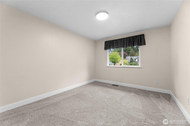 16912 49th St E, Lake Tapps, WA 98391 - spare room featuring baseboards and carpet floors