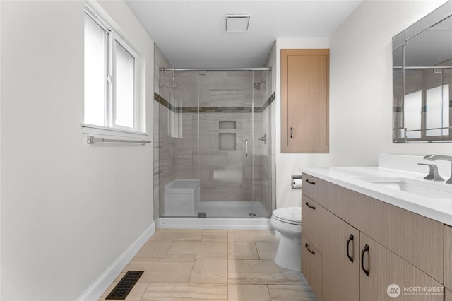 16912 49th St E, Lake Tapps, WA 98391 - full bathroom featuring toilet, a shower stall, vanity, and baseboards