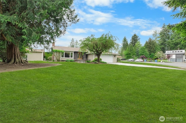 16912 49th St E, Lake Tapps, WA 98391 - single story home with concrete driveway, an attached garage, a front yard, and a chimney