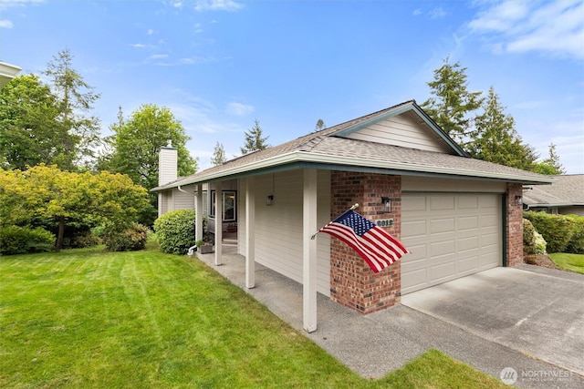 2012 Creekside Ln, Anacortes, WA 98221 - view of property exterior with a chimney, a yard, an attached garage, driveway, and brick siding