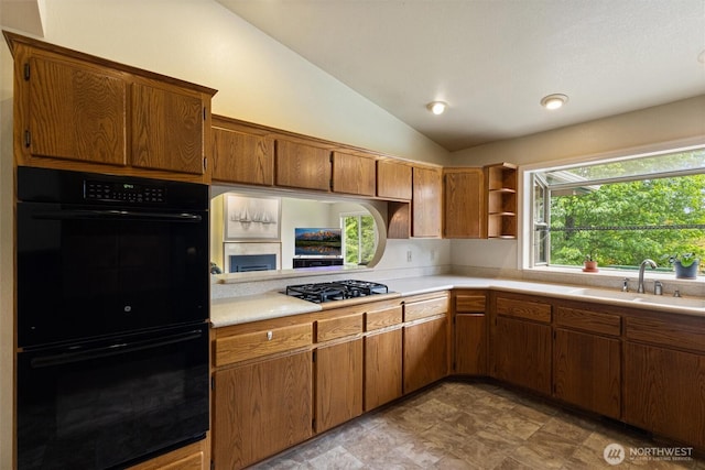 2012 Creekside Ln, Anacortes, WA 98221 - kitchen featuring black appliances, a sink, vaulted ceiling, light countertops, and open shelves
