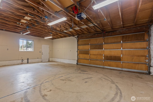 430 S 201st St, Des Moines, WA 98198 - garage featuring a garage door opener
