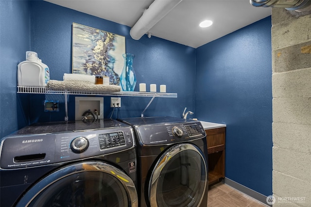 430 S 201st St, Des Moines, WA 98198 - laundry area with washing machine and clothes dryer, cabinet space, and baseboards