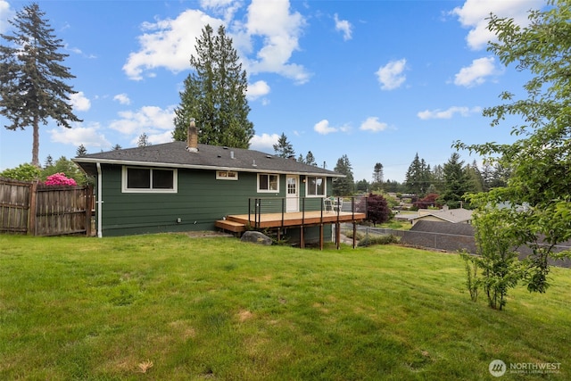 430 S 201st St, Des Moines, WA 98198 - back of property featuring a wooden deck and a chimney