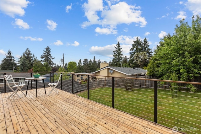 430 S 201st St, Des Moines, WA 98198 - deck with a lawn and view of wooded area