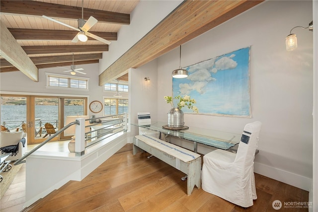 dining room with wood ceiling, ceiling fan, wood finished floors, and baseboards