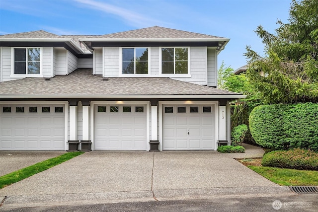 713 239th Ln SE, Sammamish, WA 98074 - garage featuring concrete driveway