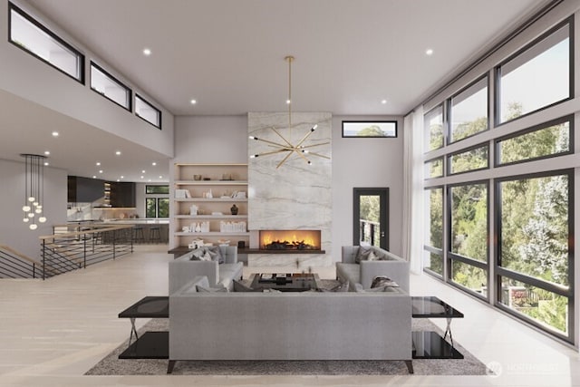 2970 96th Ave NE, Clyde Hill, WA 98004 - living room featuring a towering ceiling, a high end fireplace, and recessed lighting