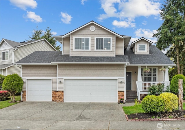 15017 46th Ave SE, Everett, WA 98208 - craftsman-style home featuring stone siding, a porch, concrete driveway, and a shingled roof