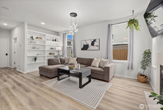 15017 46th Ave SE, Everett, WA 98208 - living area featuring light wood-style floors, baseboards, and recessed lighting