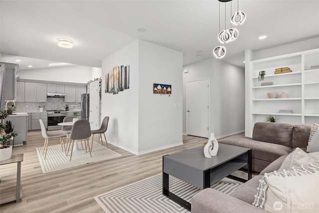 15017 46th Ave SE, Everett, WA 98208 - living room with light wood-type flooring, recessed lighting, and baseboards