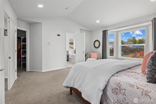 15017 46th Ave SE, Everett, WA 98208 - bedroom featuring lofted ceiling, a spacious closet, light colored carpet, baseboards, and recessed lighting