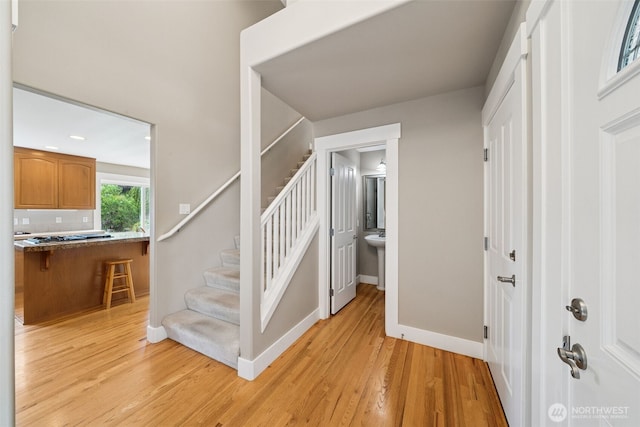 1855 Shanon Ln, Enumclaw, WA 98022 - foyer entrance featuring light wood-style flooring, baseboards, and stairway