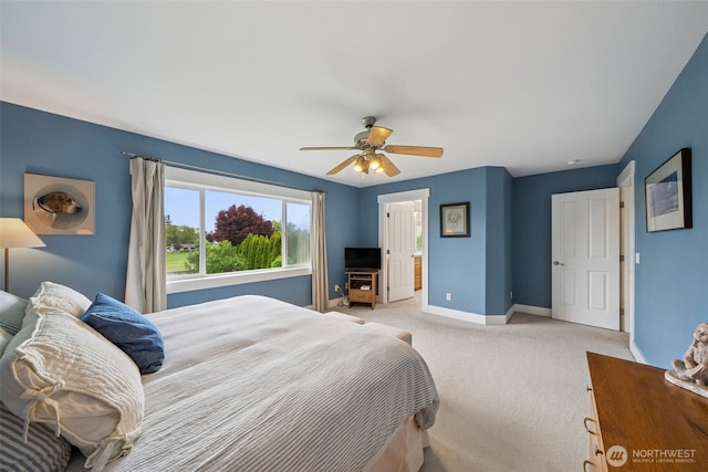 1855 Shanon Ln, Enumclaw, WA 98022 - bedroom featuring baseboards, light carpet, and ceiling fan