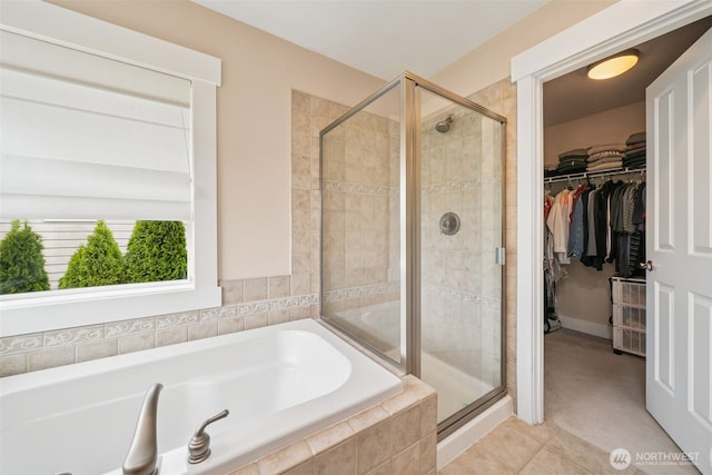 1855 Shanon Ln, Enumclaw, WA 98022 - bathroom featuring a garden tub, a stall shower, and a walk in closet
