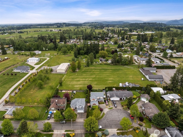 1855 Shanon Ln, Enumclaw, WA 98022 - aerial overview of property's location with a mountainous background and nearby suburban area