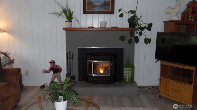145 Collar Ave, Morton, WA 98356 - living area featuring wood finished floors and a wood stove