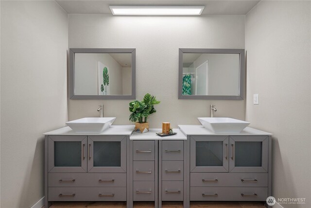 bathroom with double vanity