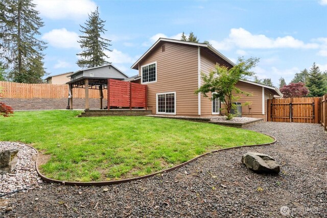 3620 Westminster Dr SE, Port Orchard, WA 98366 - rear view of property with a gazebo and a gate