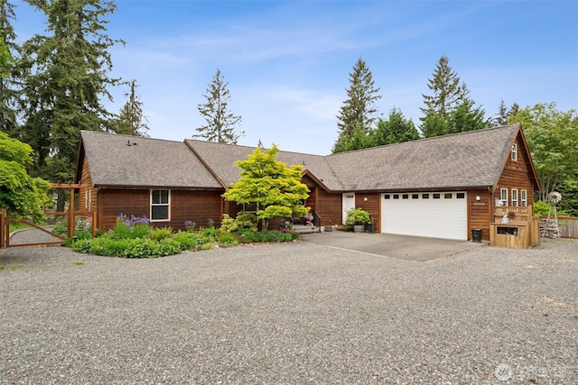 39800 224th Ave SE, Enumclaw, WA 98022 - view of front of home featuring an attached garage, gravel driveway, and roof with shingles