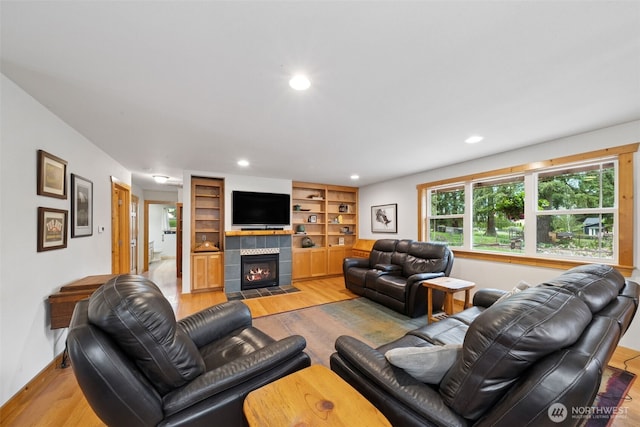 39800 224th Ave SE, Enumclaw, WA 98022 - living room with light wood finished floors, recessed lighting, and a tile fireplace