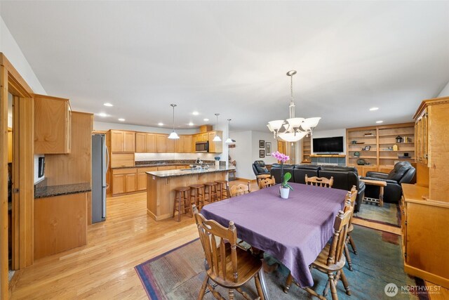 39800 224th Ave SE, Enumclaw, WA 98022 - dining space featuring a chandelier, light wood-type flooring, and recessed lighting